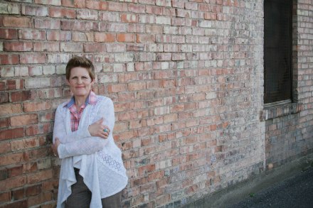 cream sweater wall window